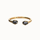 Bangle bracelet with two faceted black oval crystals